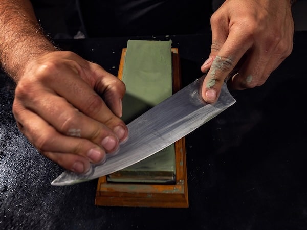 Master craftsman performing Honbazuke sharpening technique